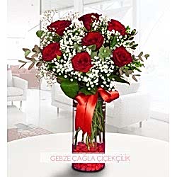 Silindir vazoda 7 gül